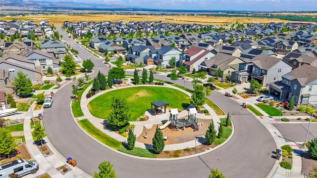 a view of a swimming pool with a outdoor seating