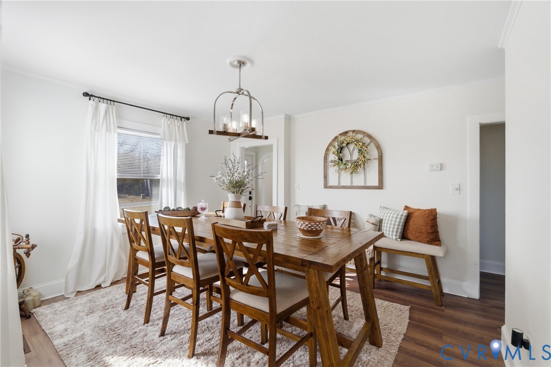 61 Mohawk Road Buckingham, VA 23921 - Photo 12 of 40 a view of a dining room with furniture and wooden floor