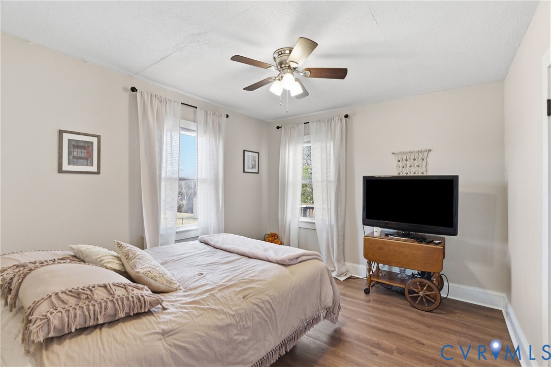 61 Mohawk Road Buckingham, VA 23921 - Photo 13 of 40 a bedroom with a bed and a flat screen tv