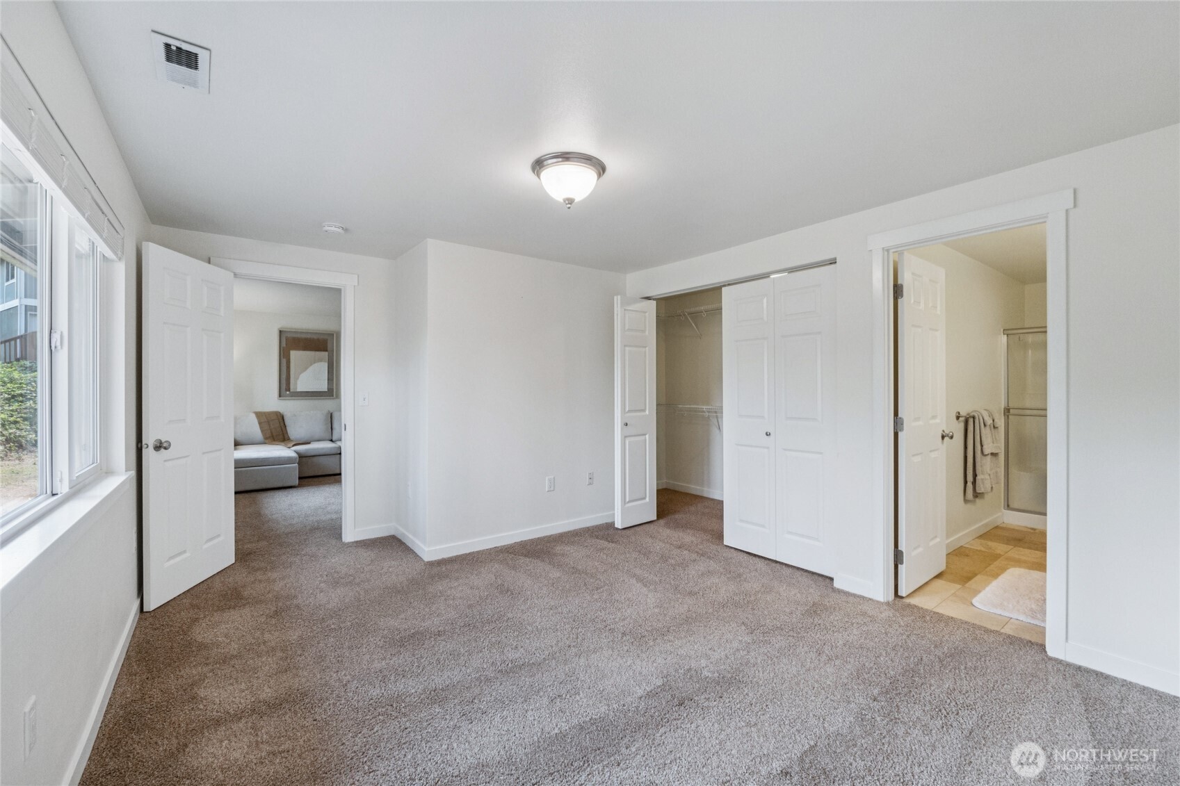 2405 B Street Steilacoom, WA 98388 - Photo 13 of 27 a view of a livingroom with wooden floor and a bathroom