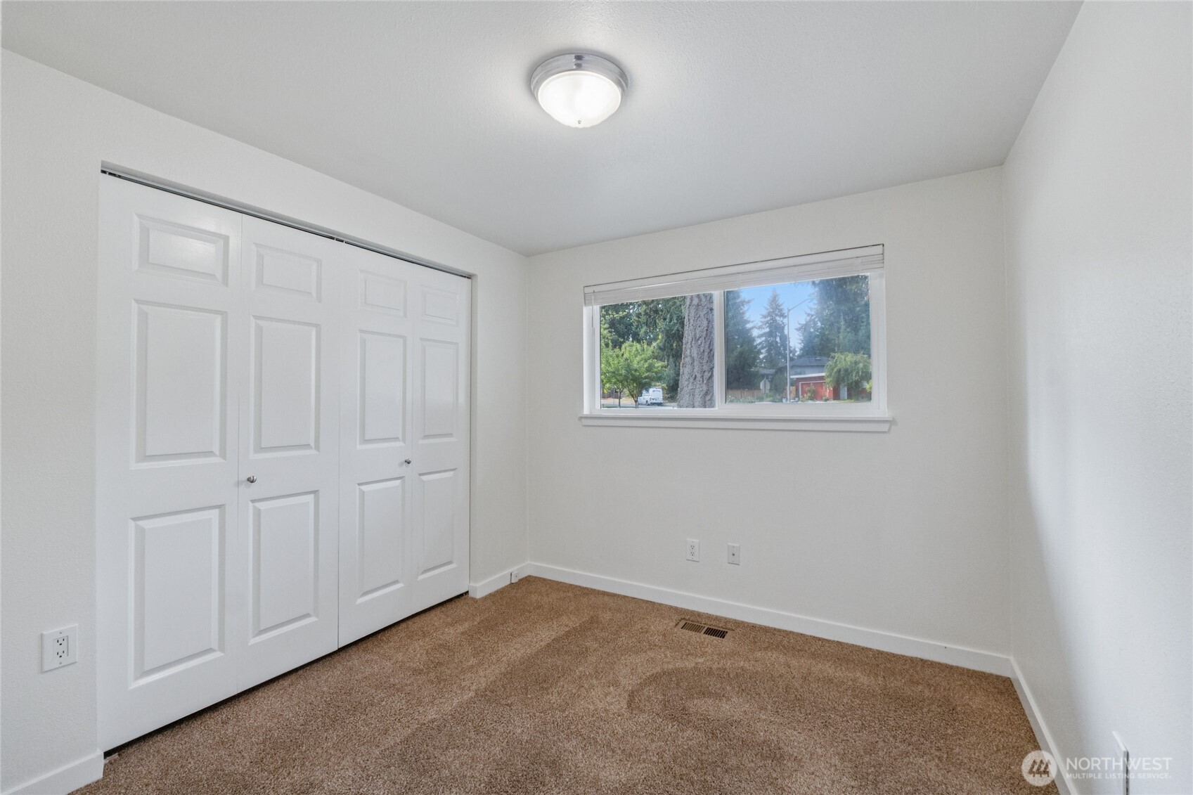 2405 B Street Steilacoom, WA 98388 - Photo 18 of 27 an empty room with a window