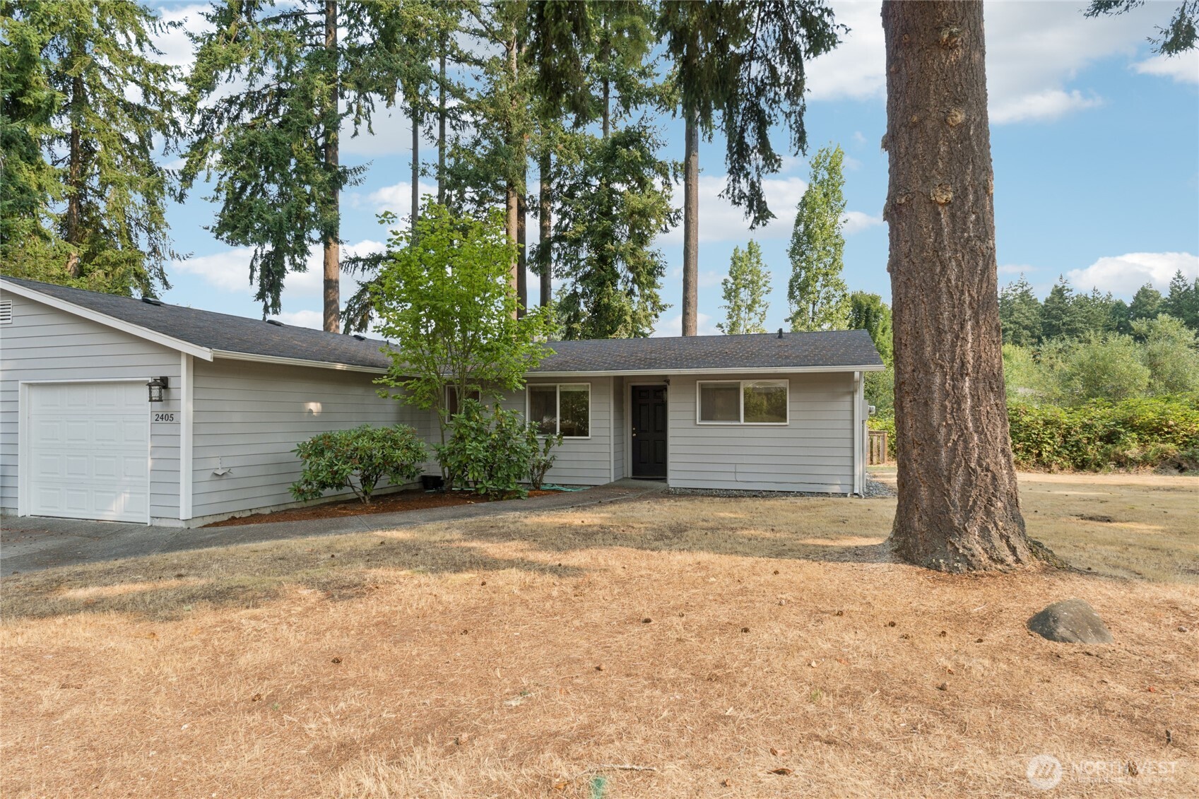 2405 B Street Steilacoom, WA 98388 - Photo 2 of 27 a view of a house with a tree in front of it