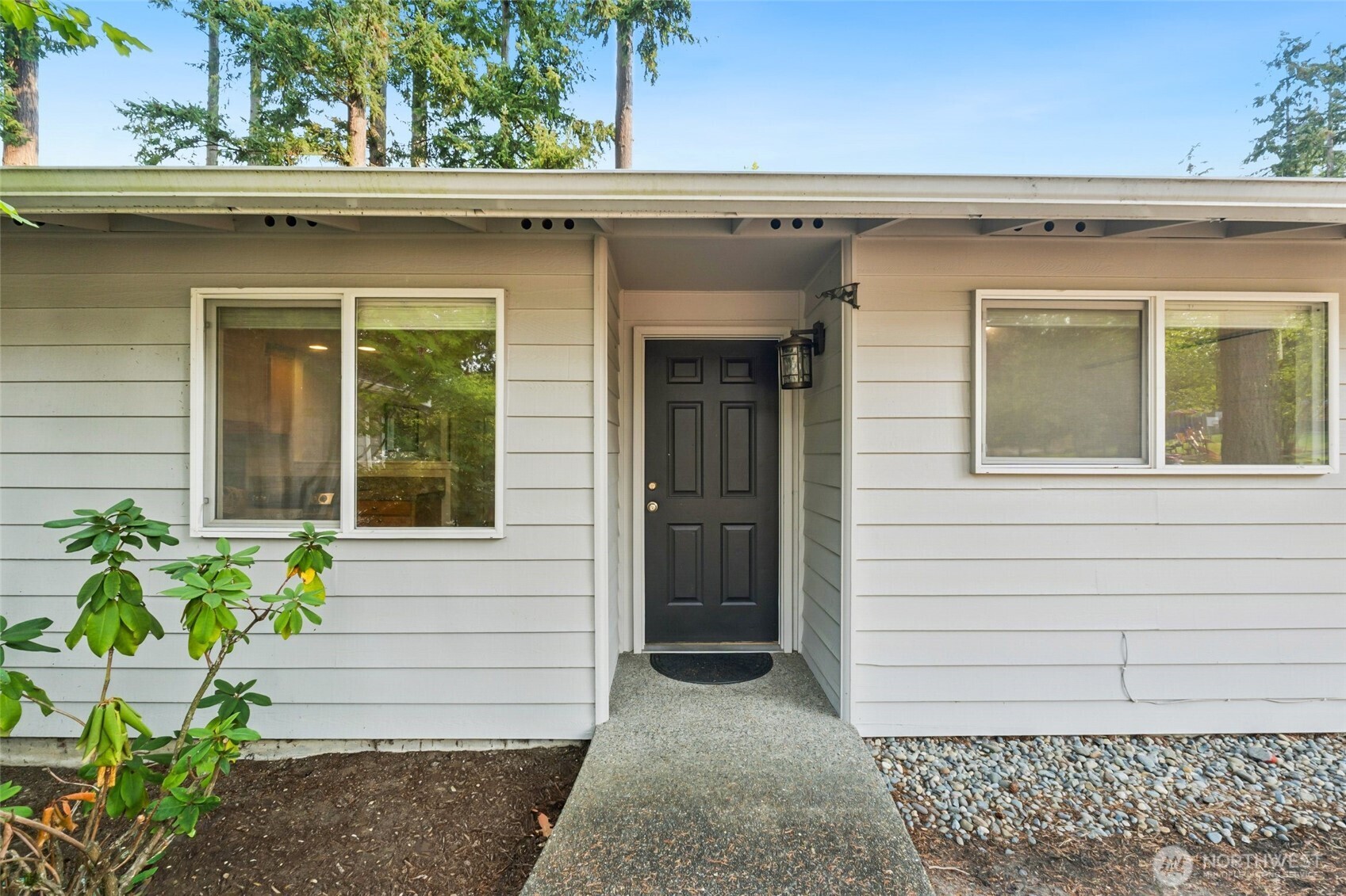2405 B Street Steilacoom, WA 98388 - Photo 3 of 27 a front view of a house with a garden