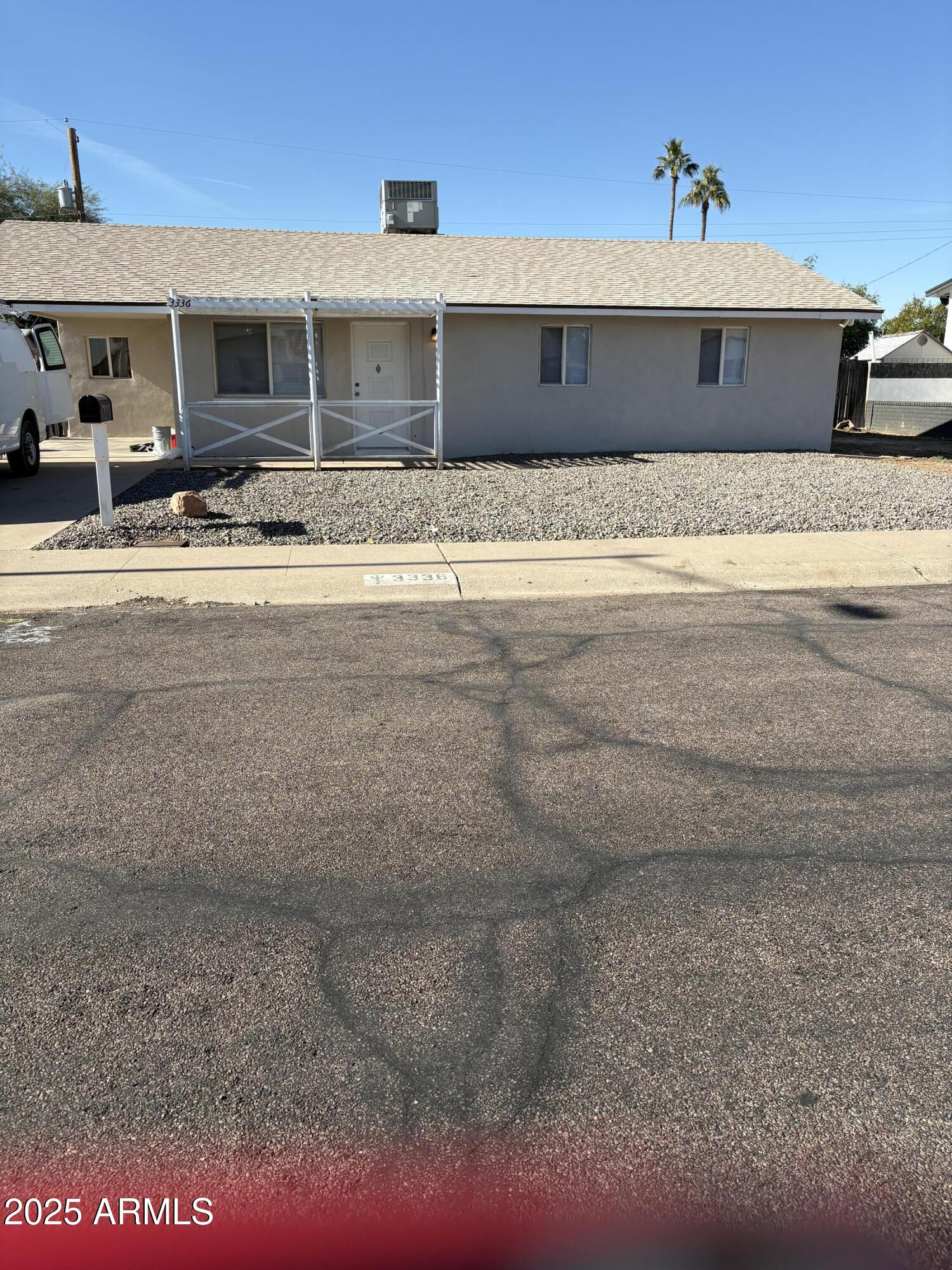 a view of the house with a yard