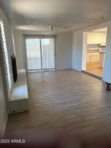 a view of an empty room and window