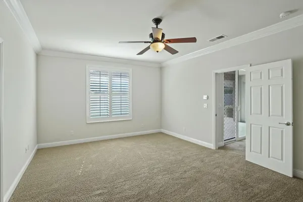 a view of room with ceiling fan