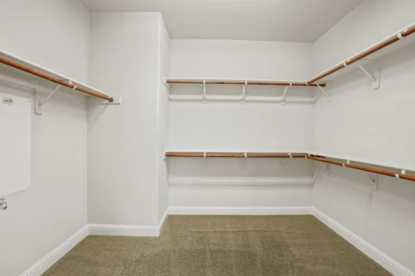 a view of a backyard of the house