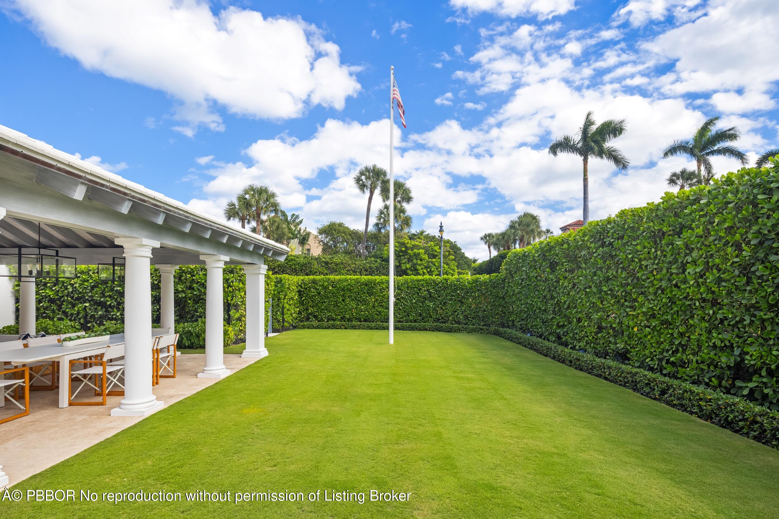 201 Banyan Road Palm Beach, FL 33480 - Photo 40 of 42 a view of a backyard with garden
