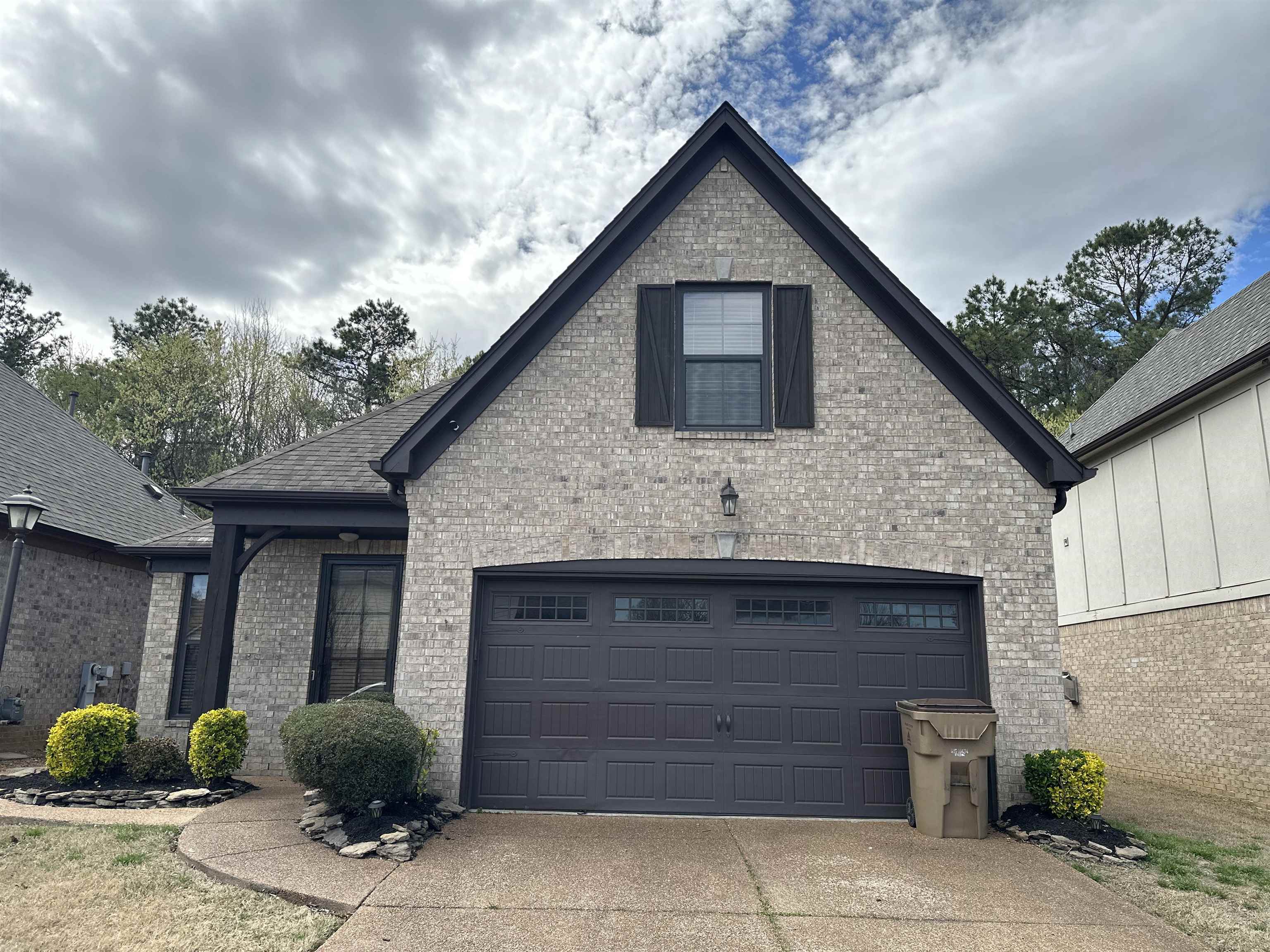 1431 Lagrange Crest Road Cordova, TN 38018 - Photo 1 of 1 a front view of a house with garden