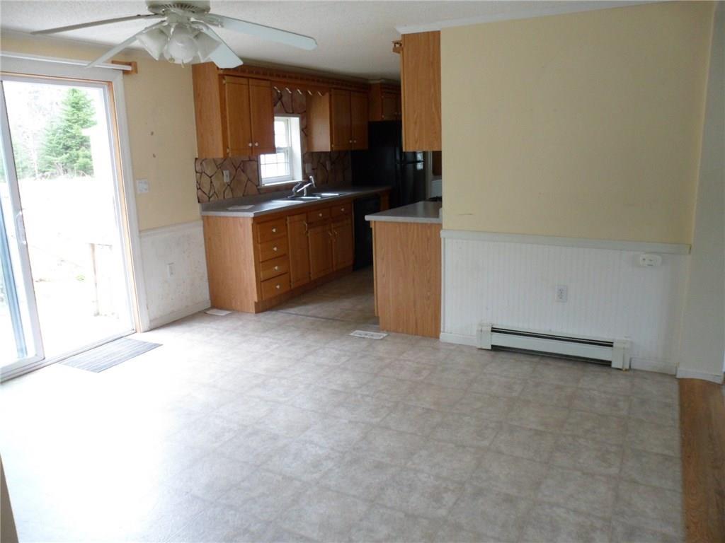 56 Bowen Road Searsport, ME 04974 - Photo 5 of 17 Dining area looking into kitchen...