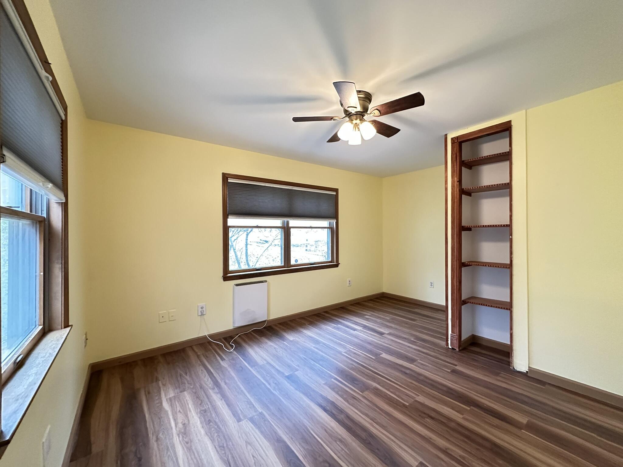 227 Image Drive Scotrun, PA 18355 - Photo 12 of 39 a view of empty room with wooden floor and fan