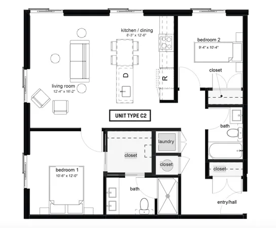 an outdoor view of a building with traffic signal lights