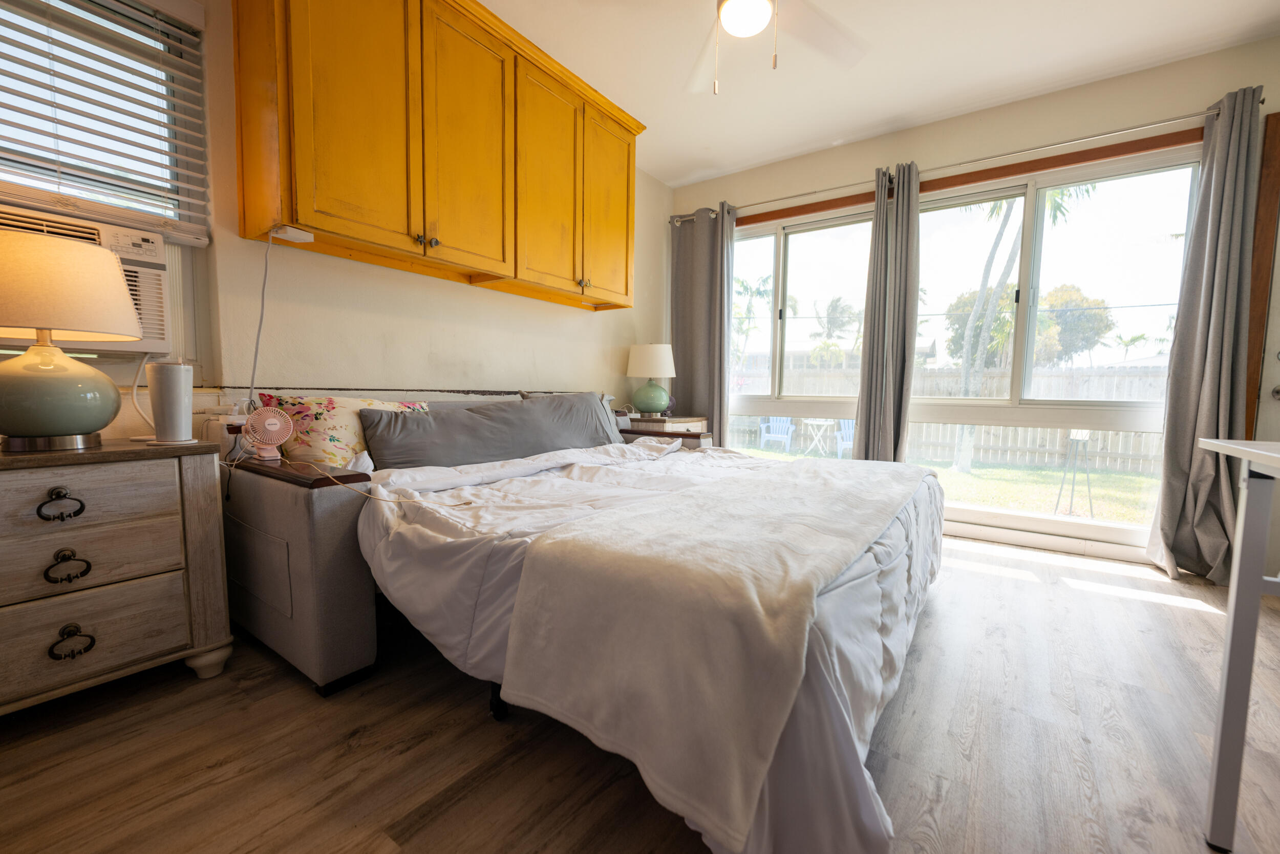 3001 Riviera Drive Key West, FL 33040 - Photo 12 of 17 a bedroom with a bed and a window with outer view