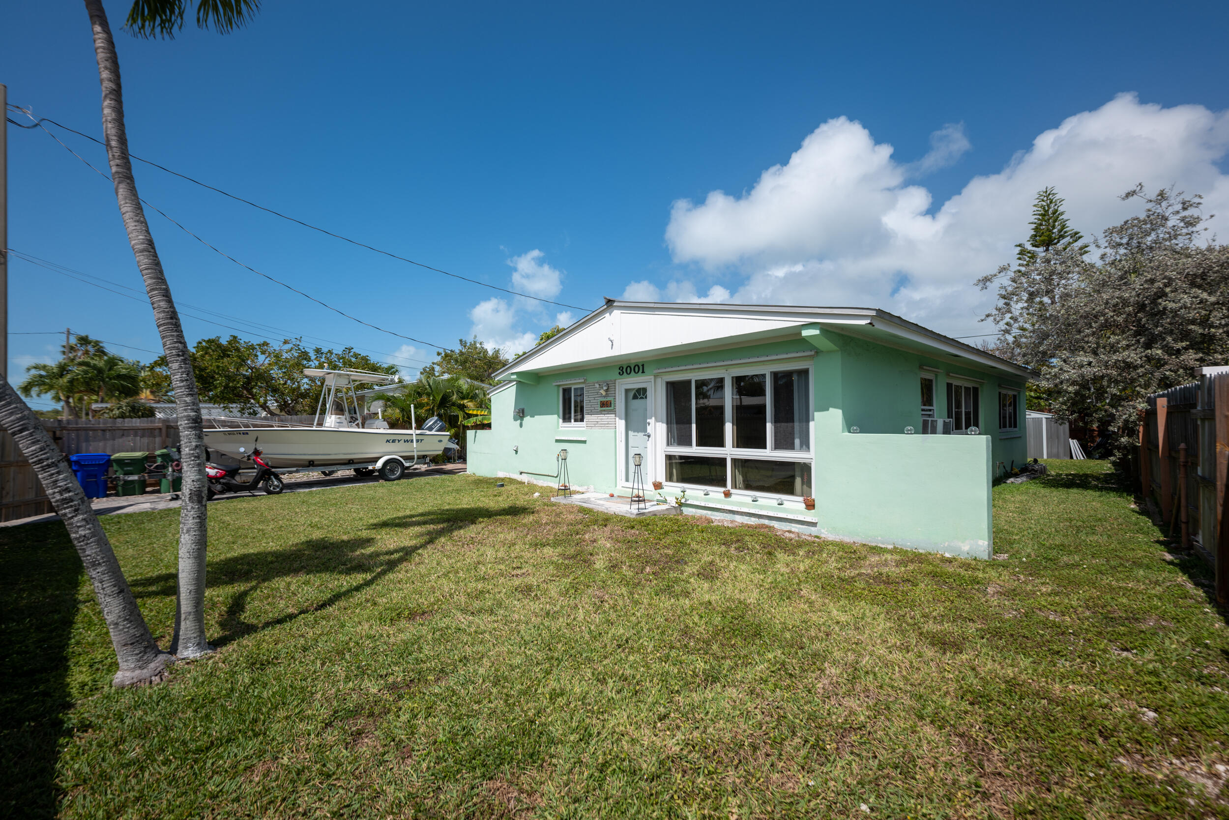 3001 Riviera Drive Key West, FL 33040 - Photo 9 of 17 a view of a house with backyard and sitting area