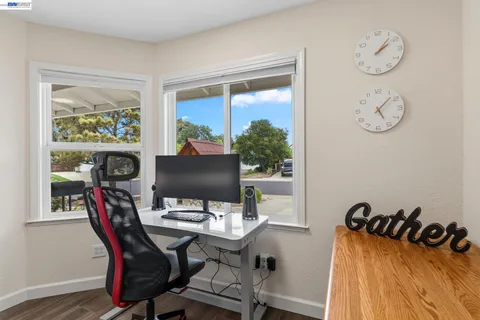 a view of a workspace with furniture