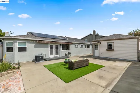 a view of a house with a garden