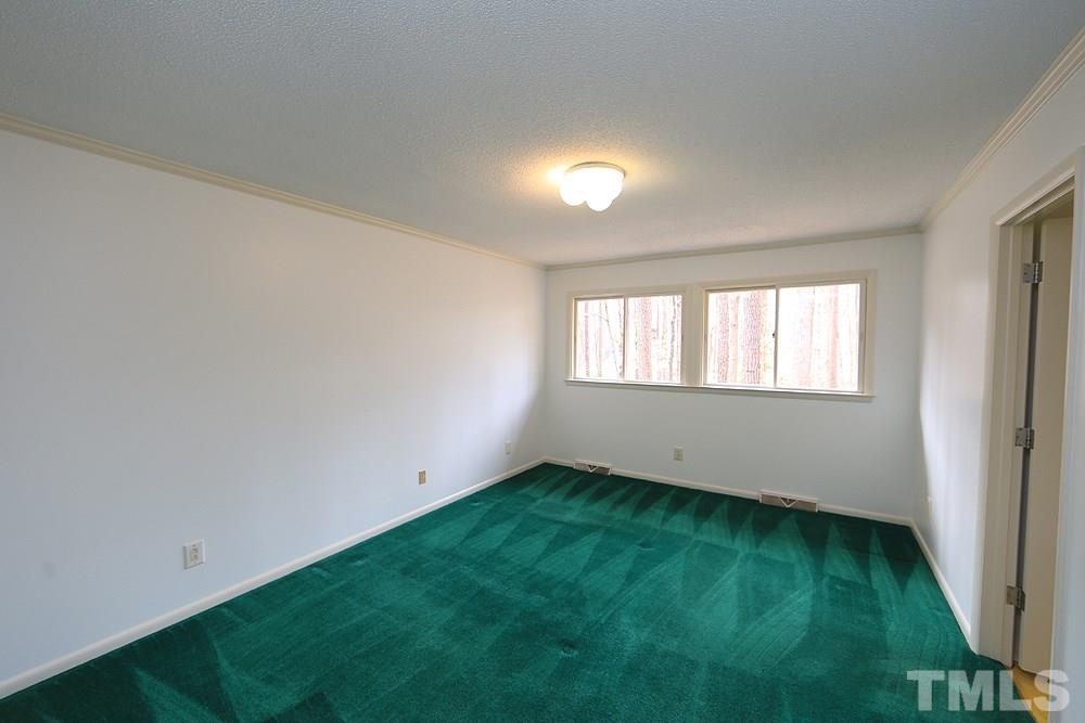 2700 Conover Court Raleigh, NC 27612 - Photo 23 of 30 a view of an empty room with window