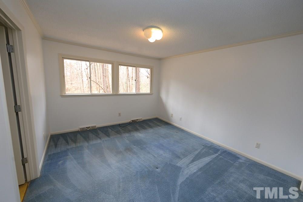 2700 Conover Court Raleigh, NC 27612 - Photo 25 of 30 an empty room with a window