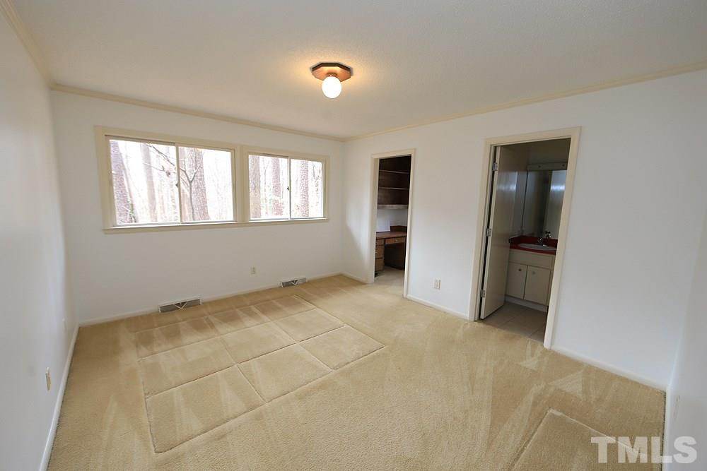 2700 Conover Court Raleigh, NC 27612 - Photo 26 of 30 a view of an empty room with a window