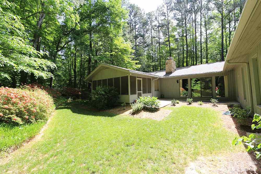 2700 Conover Court Raleigh, NC 27612 - Photo 28 of 30 a view of a house with backyard and sitting area