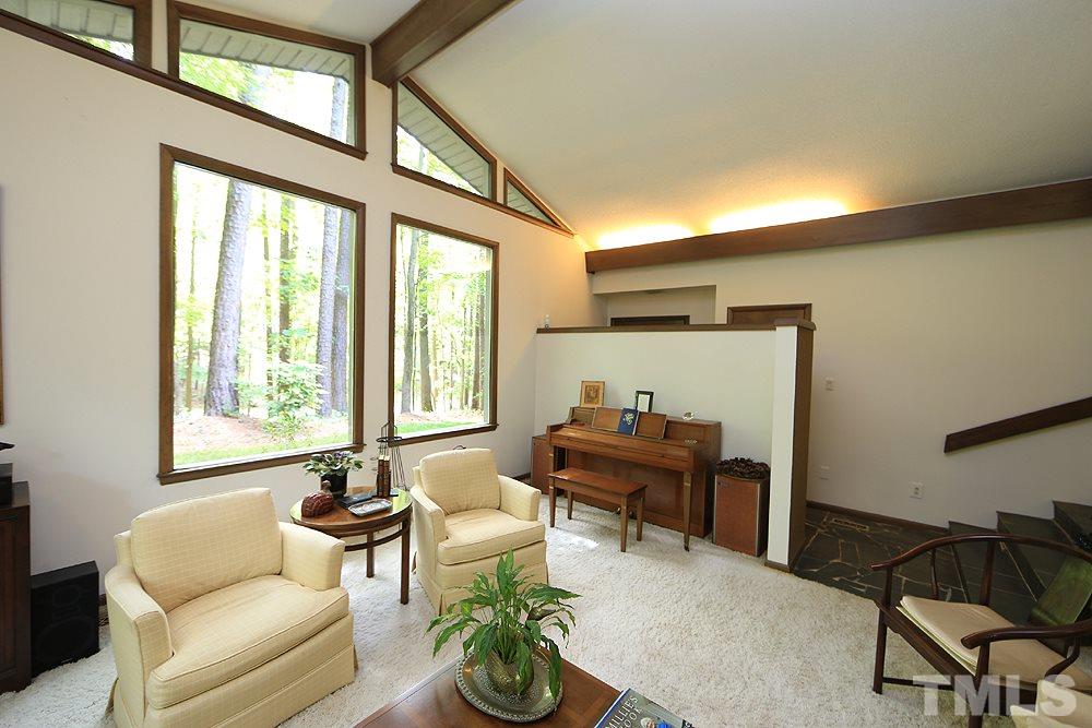 2700 Conover Court Raleigh, NC 27612 - Photo 6 of 30 a living room with furniture and a window