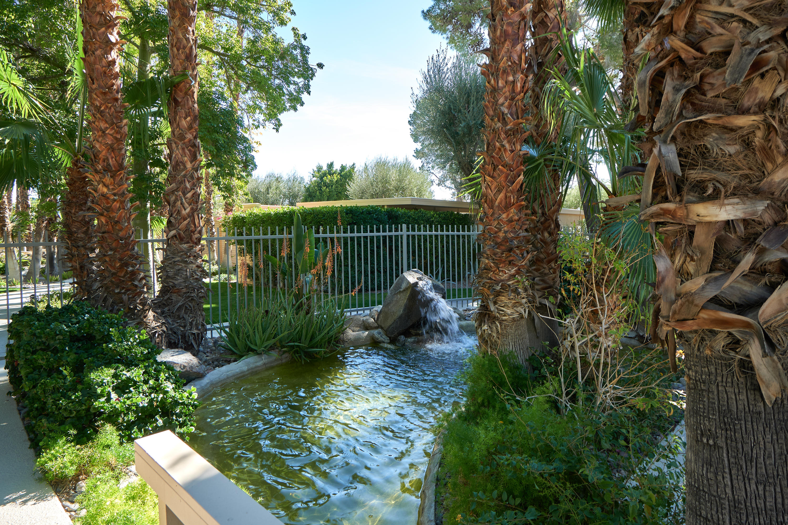 360 Cabrillo Road, Unit 128 Palm Springs, CA 92262 - Photo 20 of 21 HOA waterfall