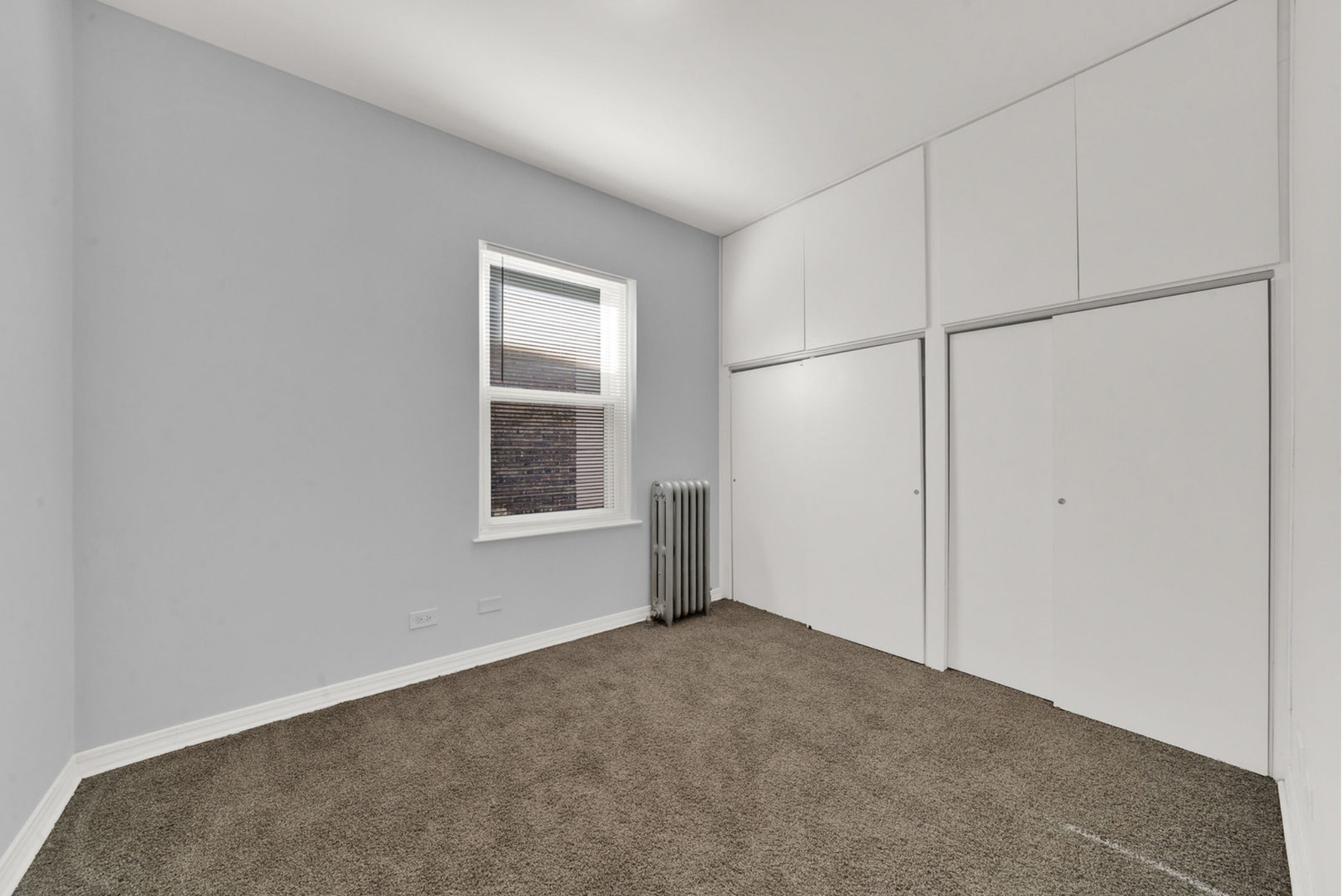 6238 South Massasoit Avenue, Unit 1 Chicago, IL 60638 - Photo 15 of 17 a view of a room that has a window in it