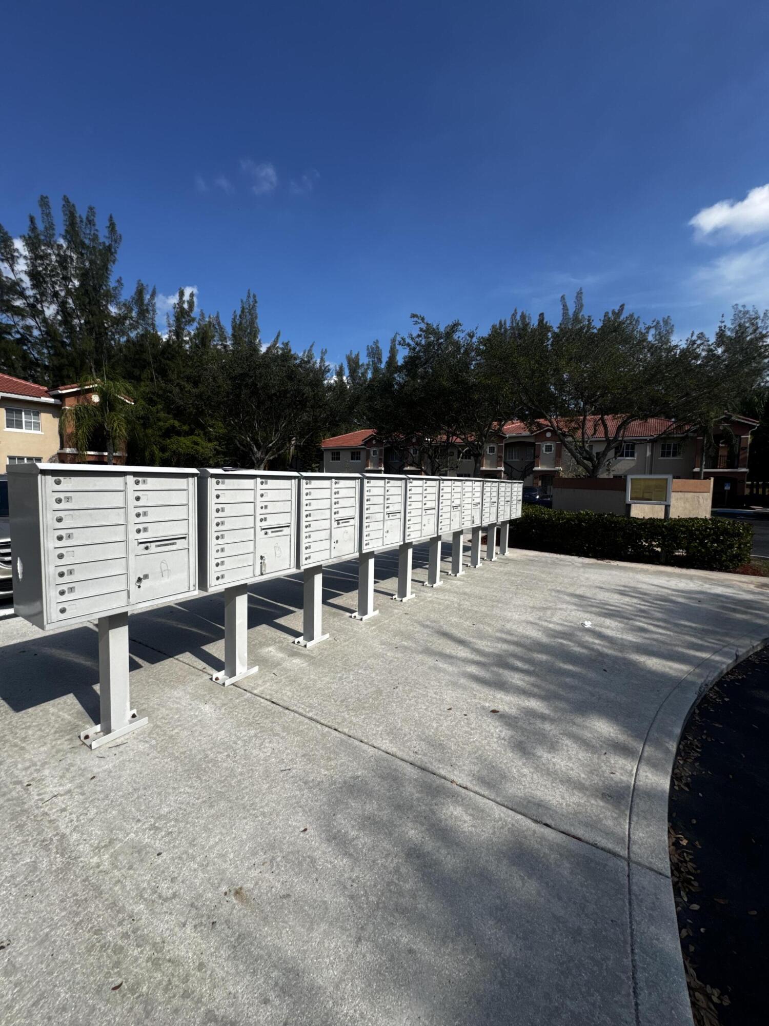 3810 North Jog Road, Unit 105 Royal Palm Beach, FL 33411 - Photo 22 of 26 a view of a terrace with sitting area