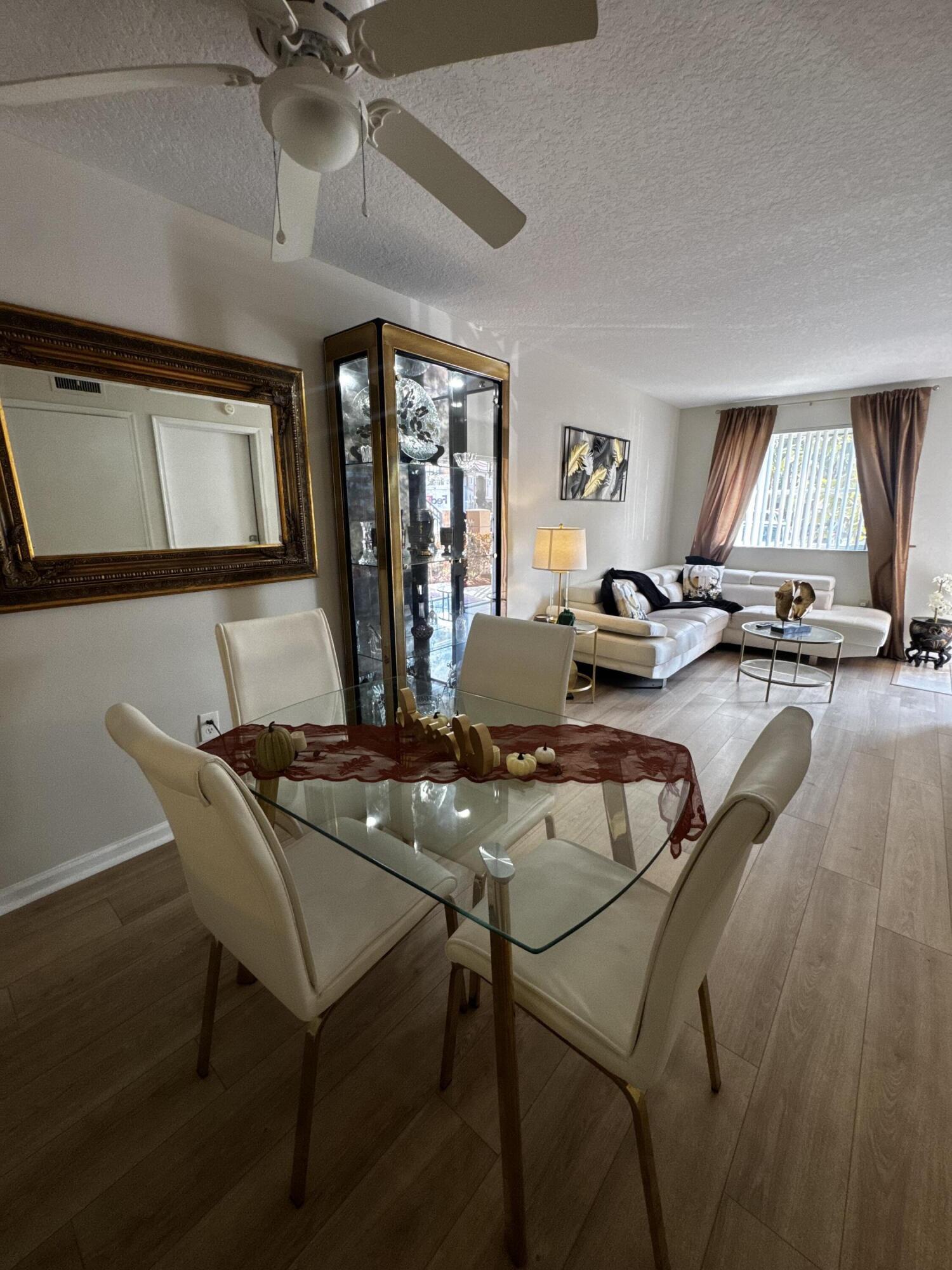 3810 North Jog Road, Unit 105 Royal Palm Beach, FL 33411 - Photo 9 of 26 a workspace with furniture and window