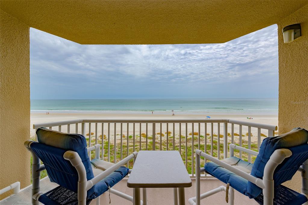 4799 South Atlantic Avenue, Unit 3030 Ponce Inlet, FL 32127 - Photo 14 of 26 a view of a balcony with chairs