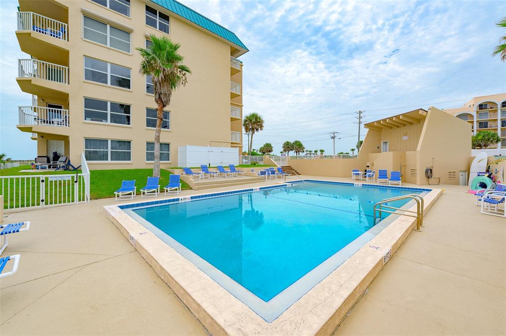 4799 South Atlantic Avenue, Unit 3030 Ponce Inlet, FL 32127 - Photo 22 of 26 a view of outdoor space with pool and seating area