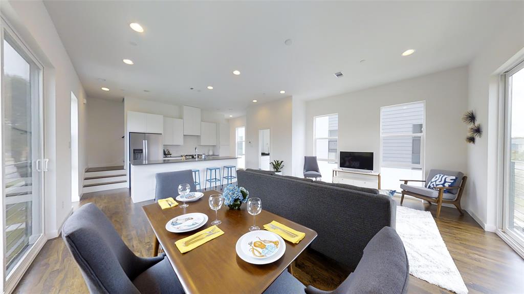 4905 Live Oak Street, Unit D Dallas, TX 75206 - Photo 3 of 19 a living room with furniture and a table