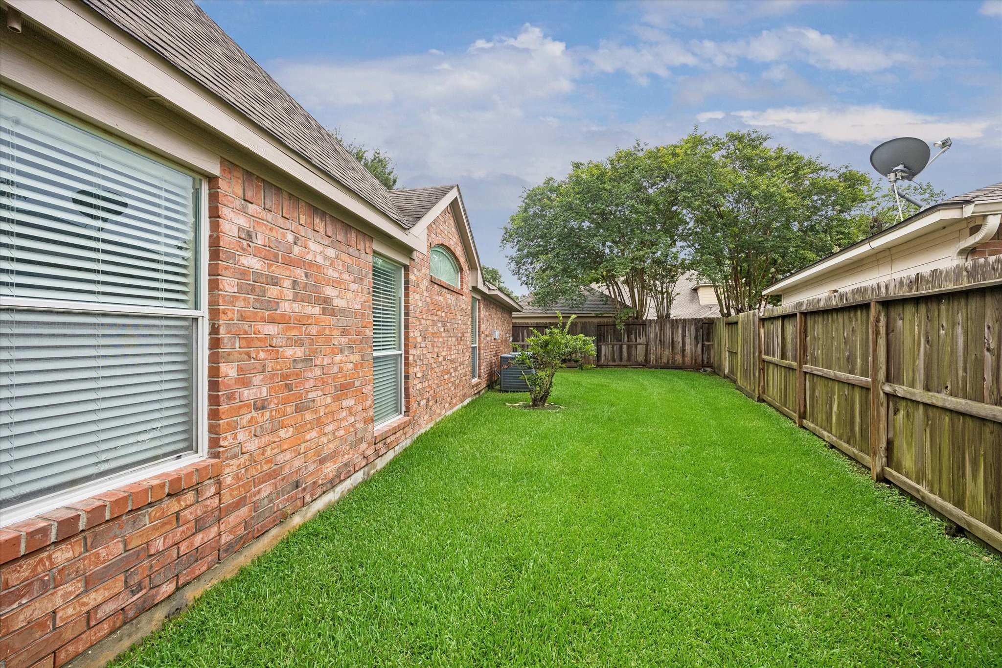 5306 Summerland Ridge Court Houston, TX 77041 - Photo 28 of 33 a view of backyard with green space
