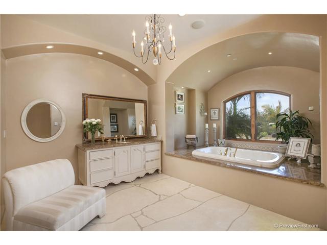 3520 Fortuna Ranch Road Encinitas, CA 92024 - Photo 7 of 11 Barrel Ceiling Entrance, Matching Arched Windows and Ceiling, Crema Marfil Random Slab Flooring, Hand Carved His and Hers Vanities, Jacuzzi Tub, Large Shower With Dual Shower Heads. Swarovski Chrystal Chandelier.