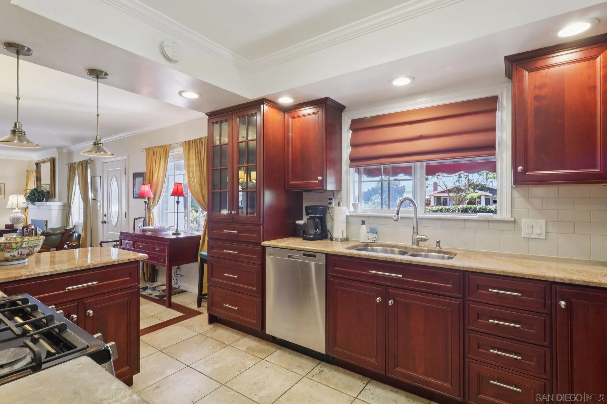 3509-11 32nd Street San Diego, CA 92104 - Photo 12 of 51 a kitchen with a sink stove and cabinets