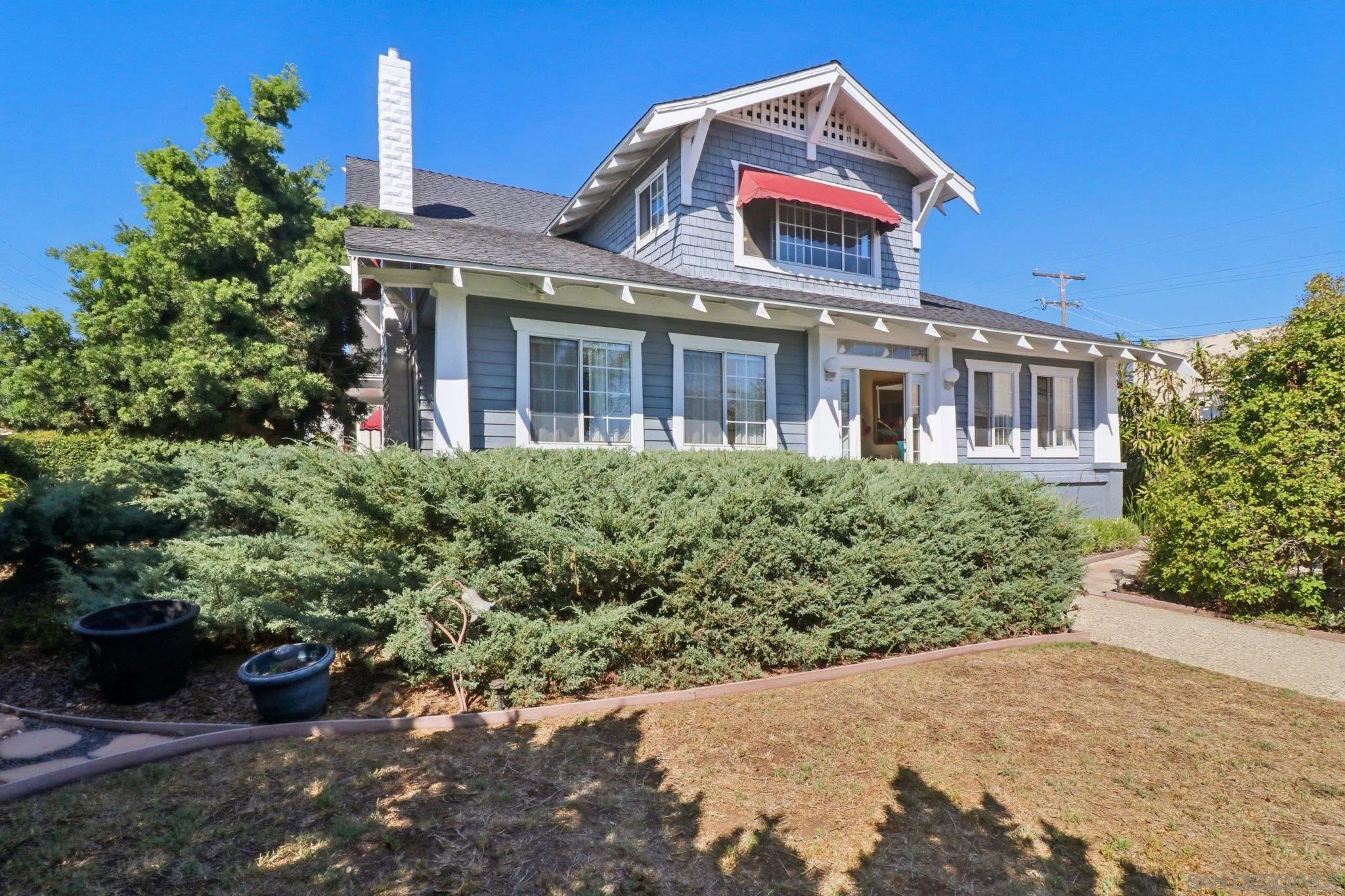 3509-11 32nd Street San Diego, CA 92104 - Photo 2 of 51 a front view of a house with a yard