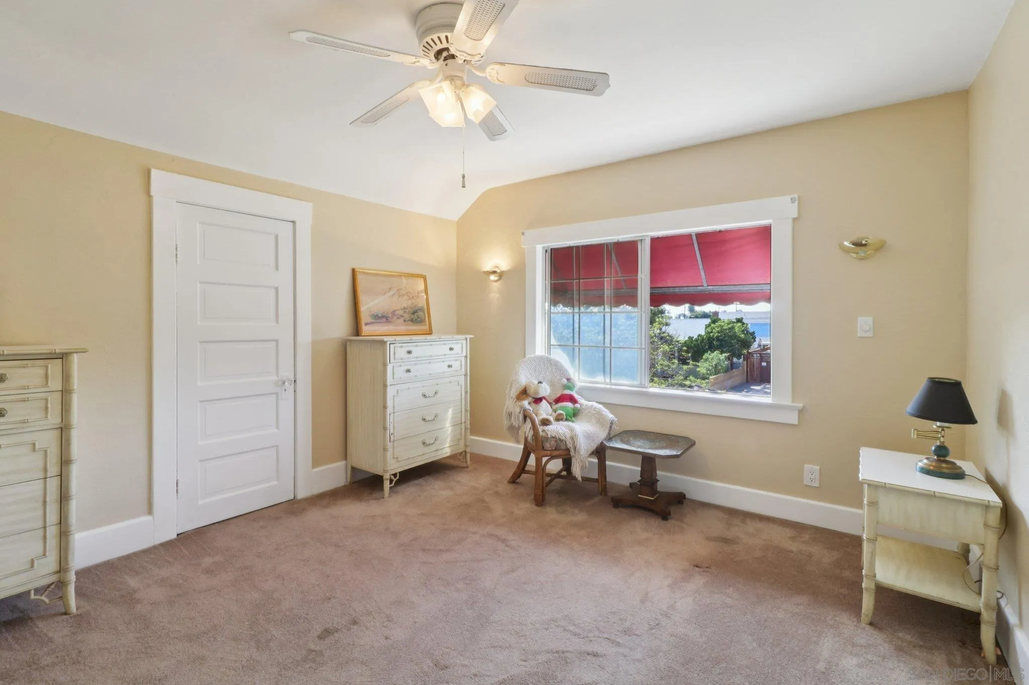 3509-11 32nd Street San Diego, CA 92104 - Photo 37 of 51 a living room with furniture and a chandelier