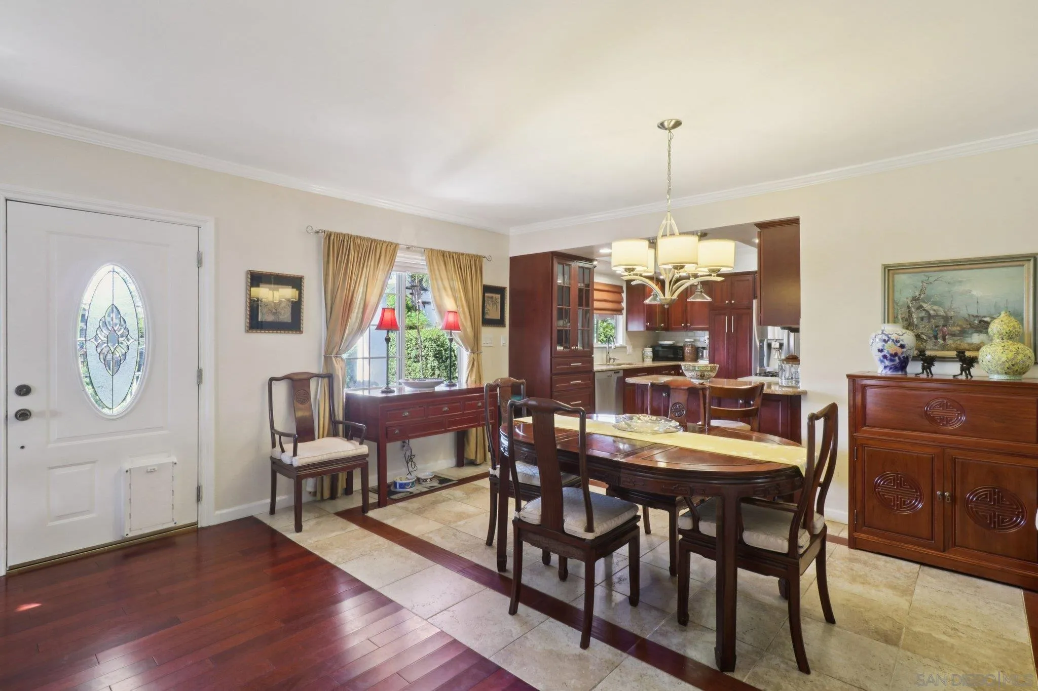 3509-11 32nd Street San Diego, CA 92104 - Photo 9 of 51 a view of a dining room with furniture window and wooden floor