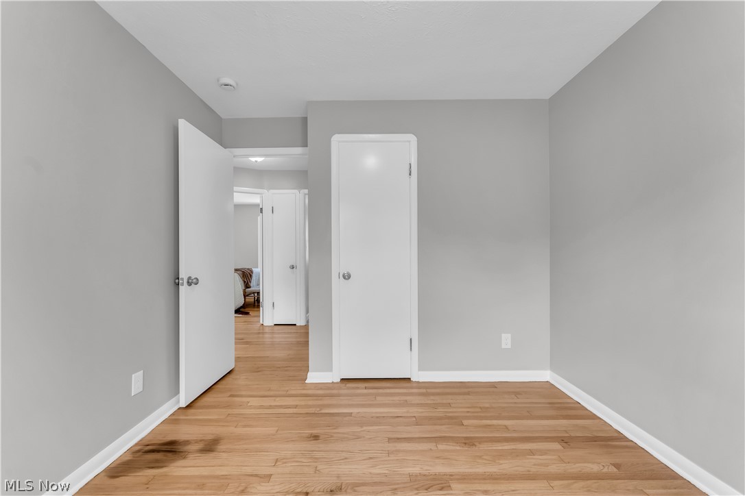 4322 Roadoan Road Brooklyn, OH 44144 - Photo 16 of 27 Unfurnished room with light hardwood / wood-style floors