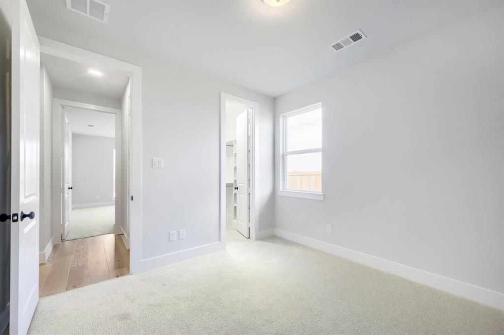 799 Mandrake Road Haslet, TX 76052 - Photo 17 of 27 wooden floor in an empty room