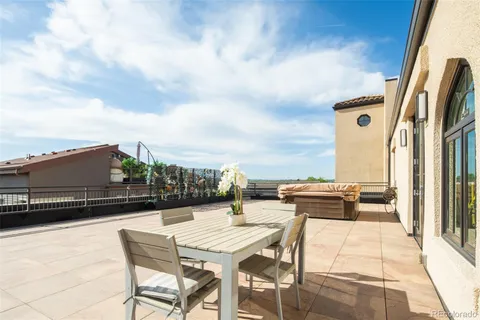 a view of a terrace with seating space
