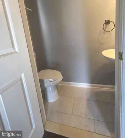 a kitchen with granite countertop stainless steel appliances and wooden cabinets