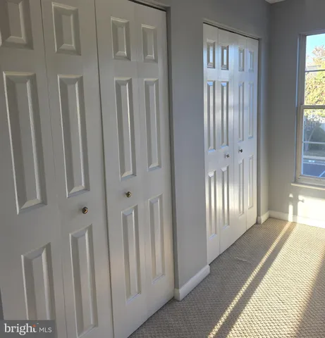 a bathroom with a bathtub and toilet