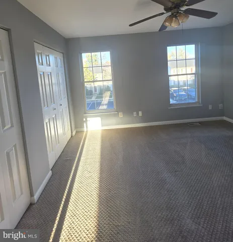 a bathroom with a toilet a sink and bathtub