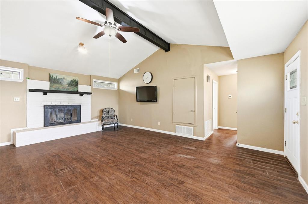 81937 Highway 289 Pottsboro, TX 75076 - Photo 7 of 33 a view of an empty room with window and fire place