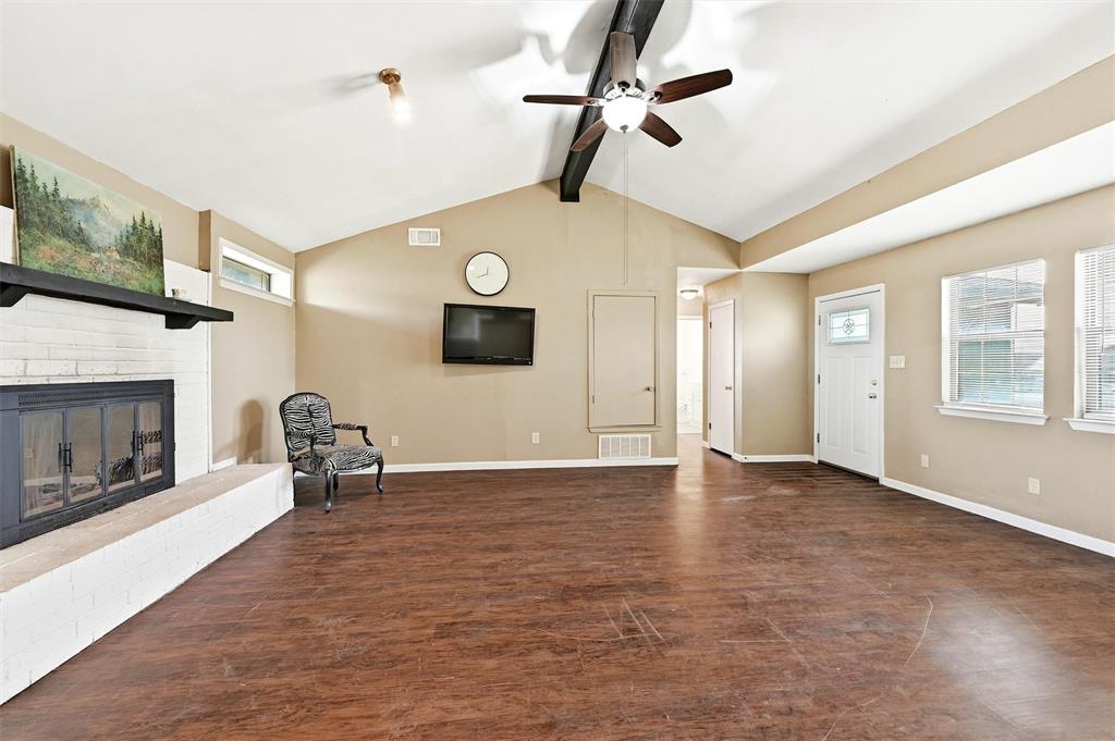 81937 Highway 289 Pottsboro, TX 75076 - Photo 8 of 33 a view of an empty room with a fireplace and a window