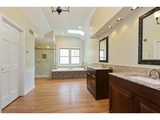 2481 Rio Grande Circle Naperville, IL 60565 - Photo 16 of 25 a kitchen with a sink and a wooden floor