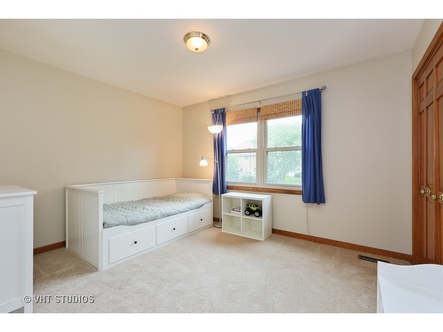 2481 Rio Grande Circle Naperville, IL 60565 - Photo 18 of 25 a view of an empty room with a window