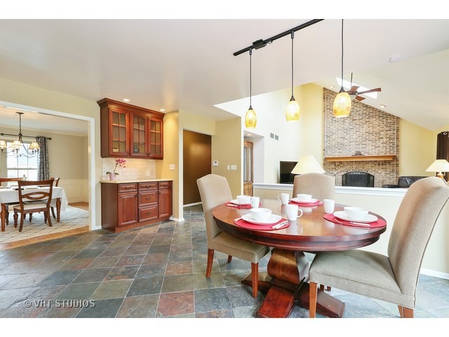 2481 Rio Grande Circle Naperville, IL 60565 - Photo 7 of 25 a view of a dining room with furniture