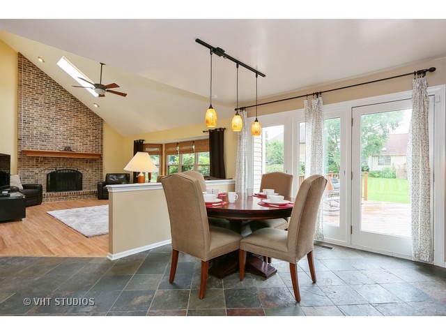2481 Rio Grande Circle Naperville, IL 60565 - Photo 8 of 25 a dining room with furniture window and wooden floor